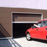 Автоматические секционные гаражные ворота Alutech